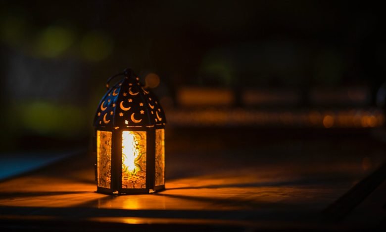 photo of ramadan light on top of table